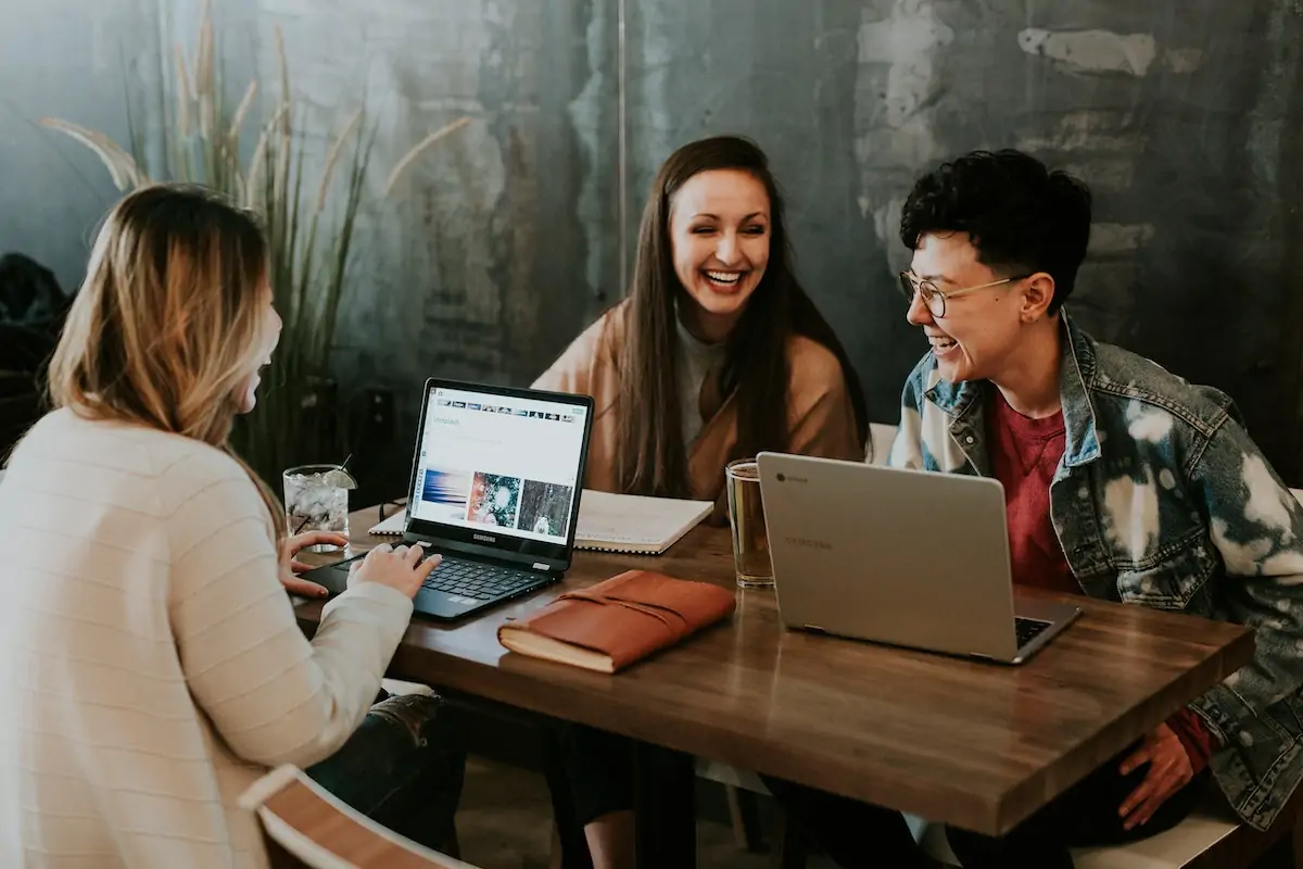 A group of freelancers working around a coffee table