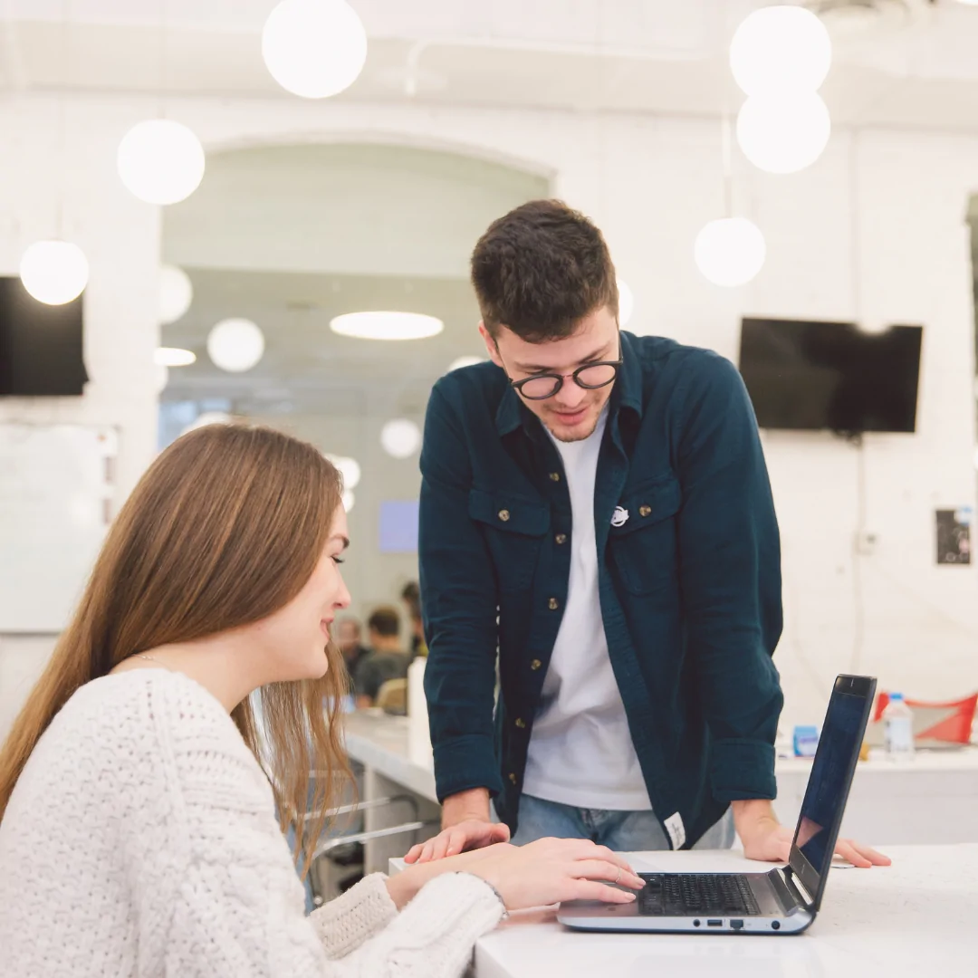 two entrepreneurs researching how much can you earn before paying tax